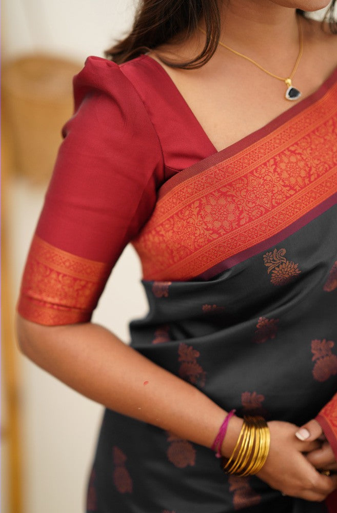 Hypnotic Black Soft Silk Saree With Snazzy Blouse Piece