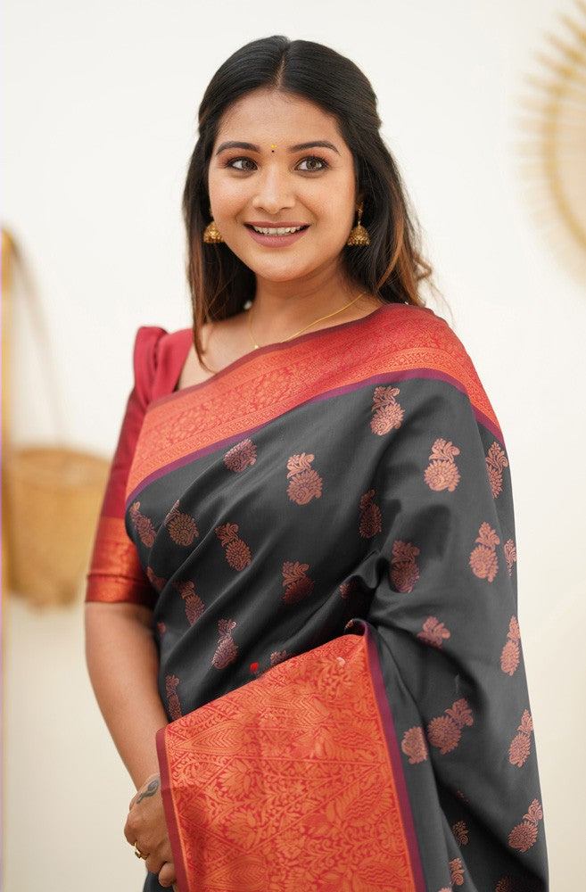 Hypnotic Black Soft Silk Saree With Snazzy Blouse Piece